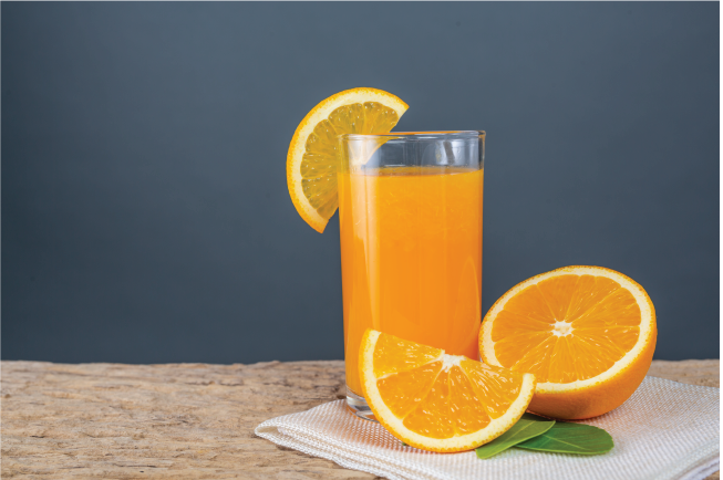 Những việc nên làm vào ngày tết - Uống nước cam cho năm mới suôn sẻ