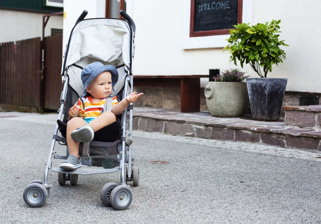 portrait adorable child stroller street bled slovenia